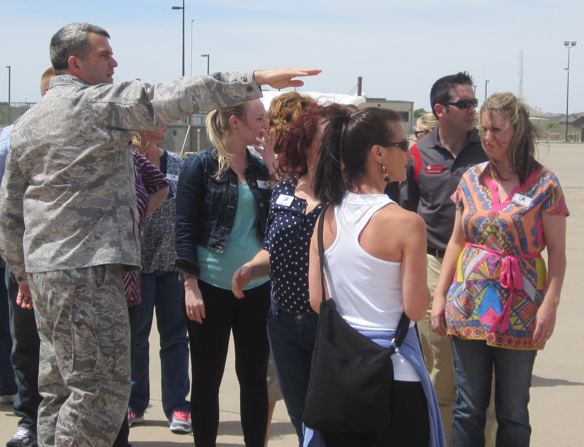 GOOFELLOW AIR FORCE BASE, Texas - Lt. Col. Derek R. Ferland, 312th Training Squadron Commander, points out the various trainers at the Louis F. Garland Department of Defense Fire Academy here to the Leadership San Angelo tour group April 10. The tour group gained a better understanding of the day-to-day operations and requirements of the 312th TRS. (Courtesy photo from San Angelo Chamber of Commerce/Sandra Pomroy)