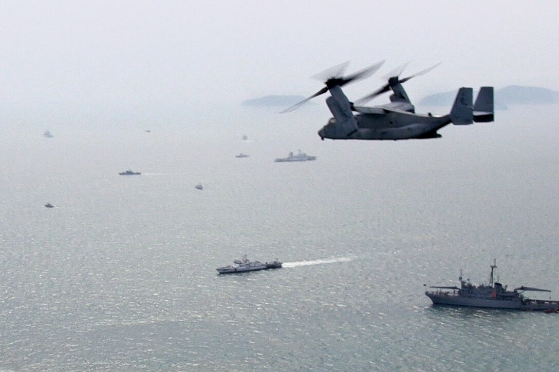 An MV-22 Osprey tiltrotor aircraft conducts search and rescue efforts, April, 21, 2014, for the Sewol, the ferry that sank April 16 off the coast of Jindo island. The crew is assigned to Marine Medium Tiltrotor Squadron 265, 31st Marine Expeditionary Unit, aboard the amphibious assault ship USS Bonhomme Richard.