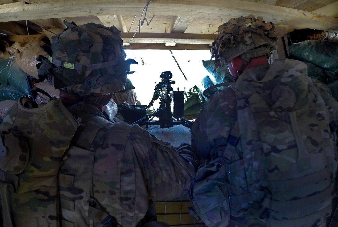 U.S. soldiers provide security on Observation Post English in Afghanistan's Logar province, April 18, 2014. The soldiers are assigned to the 10th Mountain Division's Company B, 2nd Battalion, 87st Infantry Regiment, 3rd Brigade Combat Team.