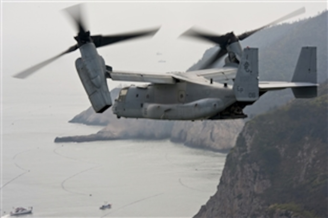 A MV-22 Osprey tiltrotor helicopter assists South Korea's search operations, April 21, 2014, near the site of the Sewol, the ferry that sank April 16 off Jindo island. The helicopter is assigned to the 31st Marine Expeditionary Unit, attached to the amphibious assault ship USS Bonhomme Richard.