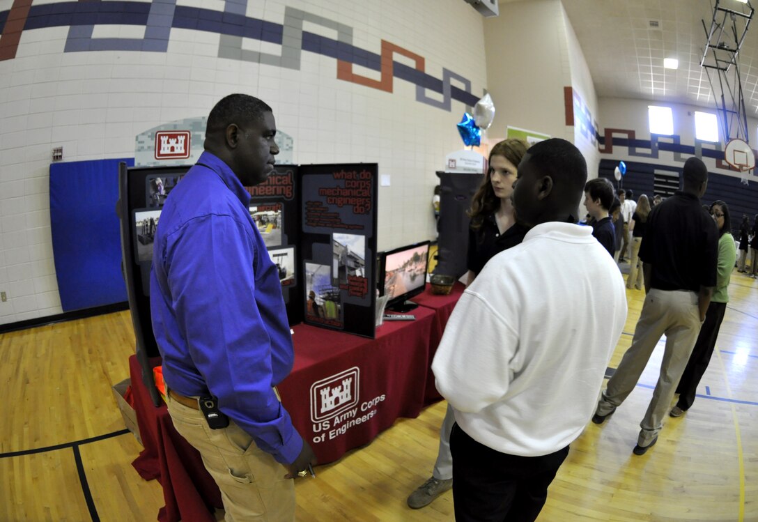 MIDWAY, Ga. – Members of the U.S. Army Corps of Engineers Savannah District participated in a STEM Career Expo at Midway Middle School to encourage more than 800 students to pursue careers in Science, Technology, Engineering and Math (STEM). April 22, 2014. Corps team members Reggie Terry (pictured) and Andre Wright from the Fort Stewart field office talked to kids about jobs available in the Corps of Engineers. 