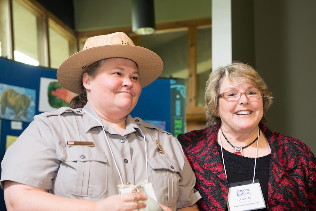 Corps of Engineers Park Ranger Nancy Sumners accepts the Rivers Alive Government Partner of the Year award on behalf of Hartwell Lake at the annual awards ceremony, April 15 in Atlanta. Sumners is accompanied by Rivers Alive Board Member Lynn Cobb.