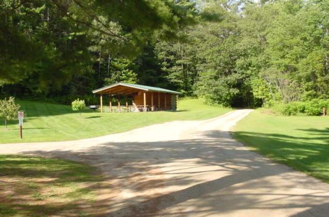 The shelter on the north side of Winhall Brook Campground used for group gatherings and weekend interpretative programs given by Park Rangers at Ball Mountain Lake, Jamaica, Vt. (U.S. Army Corps of Engineers photo)
					