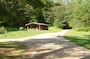 The shelter on the north side of Winhall Brook Campground used for group gatherings and weekend interpretative programs given by Park Rangers at Ball Mountain Lake, Jamaica, Vt. (U.S. Army Corps of Engineers photo)
					