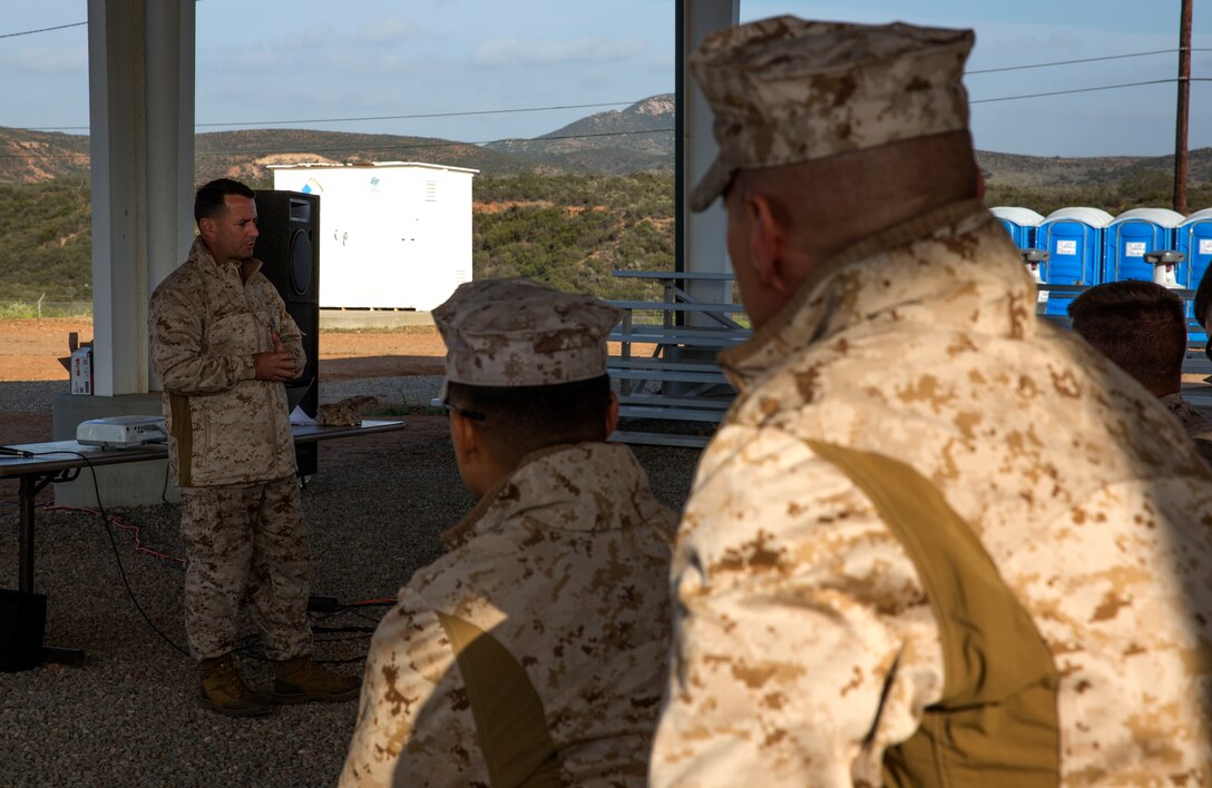 Master Sgt. Ovidio Parra, left, a symposium mentor with Marine Aviation Logistics Squadron 11, leads a discussion during Committed and Engaged Staff Sergeant Professional Military Education aboard Marine Corps Air Station Miramar, Calif., April 22. Parra and his fellow master sergeants led discussions on a variety of topics allowing the staff sergeants to teach each other.