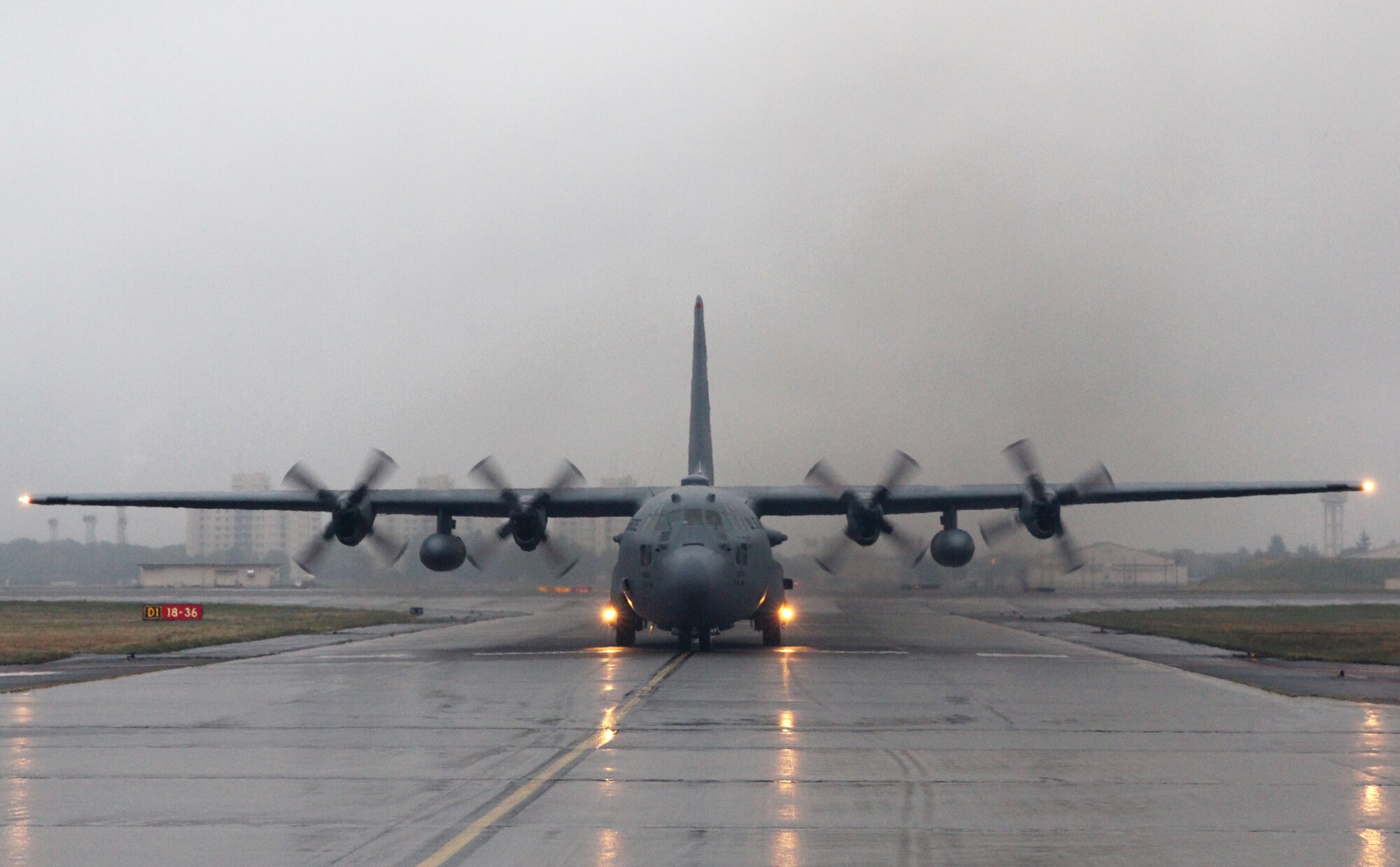 Yokota Air Base C-130 Hercules return from a combat airlift exercise at Gwangju Air Base, Korea, during Exercise Max Thunder, April 18, 2014. Max Thunder is the Air Component-led portion of Exercise Foal Eagle, a series of joint and bilateral exercises that integrate ground, air, naval, expeditionary and special operations. (U.S. Air Force photo by 2d Lt. Ashley Wright/Released)
