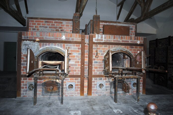 DACHAU, Germany – Two ovens in the first crematorium at Dachau the first Nazi concentration camp, which opened in 1933 outside Munich, Germany, were used to cremate the bodies of dead prisoners. People initially detained in the camp included Jews, artists, intellectuals, the physically and mentally handicapped and homosexuals.  Prisoners died from malnutrition, disease and overwork or were executed. When World War II began, some able-bodied prisoners were used as slave labor and others were used for medical experiments. (U.S. Air force photo/Senior Master Sgt. Kelley J. Stewart)
