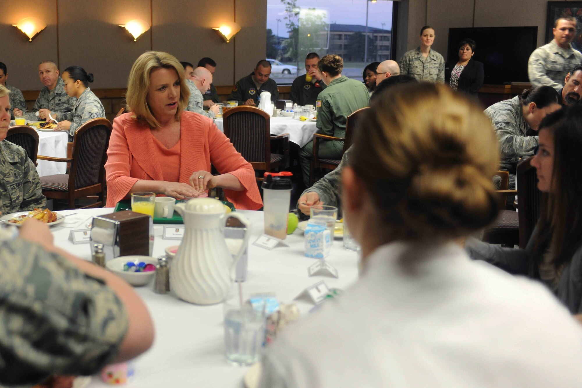 ALTUS AIR FORCE BASE, Okla. -- Secretary of the Air Force Deborah Lee James has breakfast with Airmen of the 97th Air Mobility Wing at the Dining Facility during a base visit April 23, 2014. James visited Altus AFB to get a firsthand look at the wing’s mission and speak with Airmen about current topics and the future of the Air Force. (U.S. Air Force photo by Senior Airman Jesse Lopez/Released)