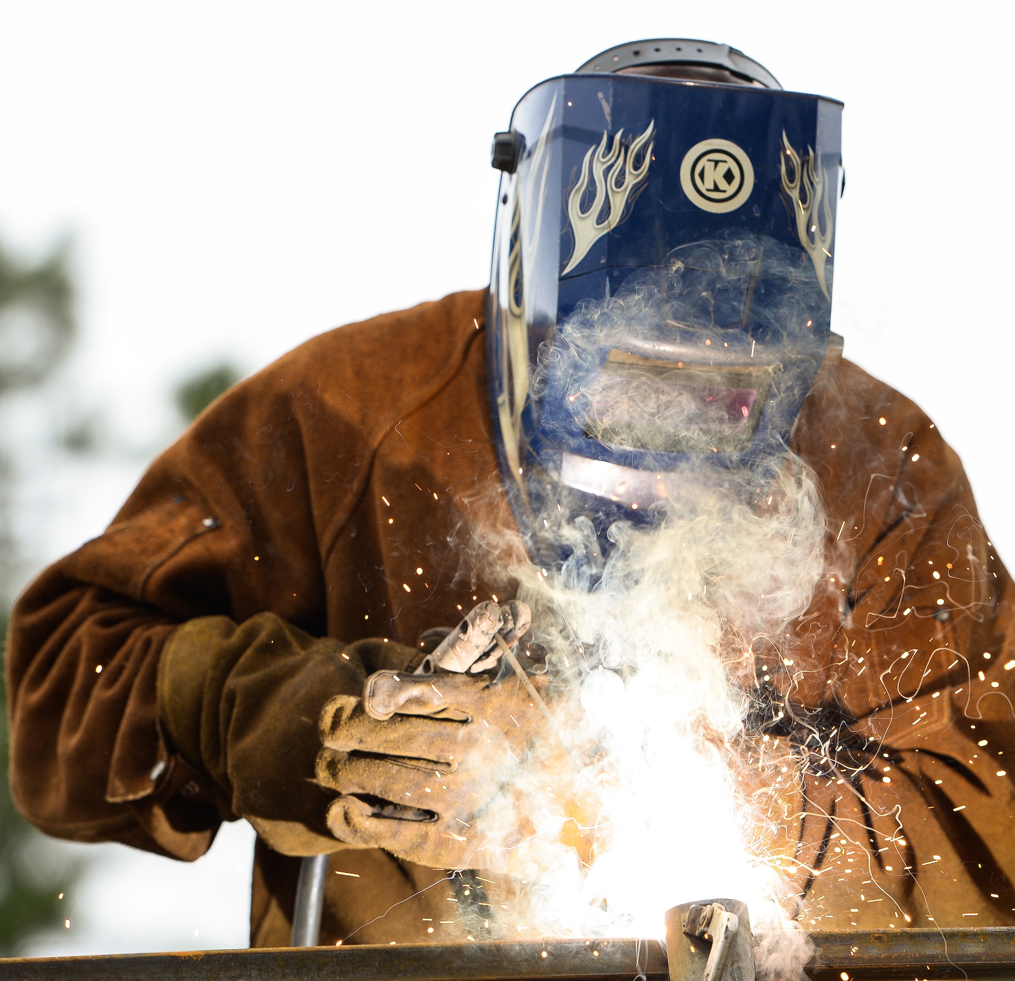 U.S. Air Force Senior Airman Axel Fiksman, a structures specialist with the 116th Civil Engineering Squadron (CES), Georgia Air National Guard (ANG), Robins Air Force Base, Ga., welds a cross bar onto a pole while building a fence at Silver Flag training at Tyndall Air Force Base, Fla., April 17, 2014. During the weeklong course, Guardsmen from the 116th CES along with 219 Airmen from multiple U.S. Air Force active duty, Reserve and ANG units trained on building and maintaining bare-base operations at a simulated forward-deployed location. In addition, they honed their combat and survival skills, repaired simulated bomb-damaged runways, practiced EOD scenarios, set up base facilities and established various critical base operating support capabilities. Thirty-four Airmen from the 116th CES attended the exercise that consisted of extensive classroom and hands-on training culminating in an evaluation of learned skills on the last day of class. (U.S. Air National Guard photo by Master Sgt. Roger Parsons/Released)