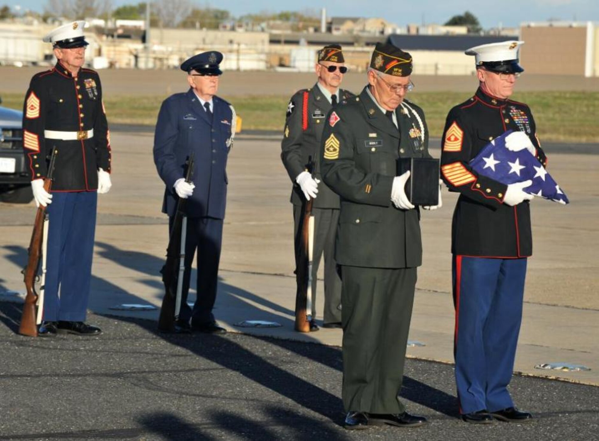 Members from the Veterans of Foreign Wars from throughout Utah stood in formation April13 on the south end of the Hill Air Force Base runway to commemorate the life of Lt. Col. (Ret.) Edison Phillips Janney, a Utah native. Janney served 23 years in the military. While serving as a bombadier with the 95th Bomb Group he was captured by German forces on October 10, 1943, where he remained for nearly two years. His last wish was for his ashes to be spread across an Air Force runway. (U.S. Air Force photo by R. Nial Bradshaw)
