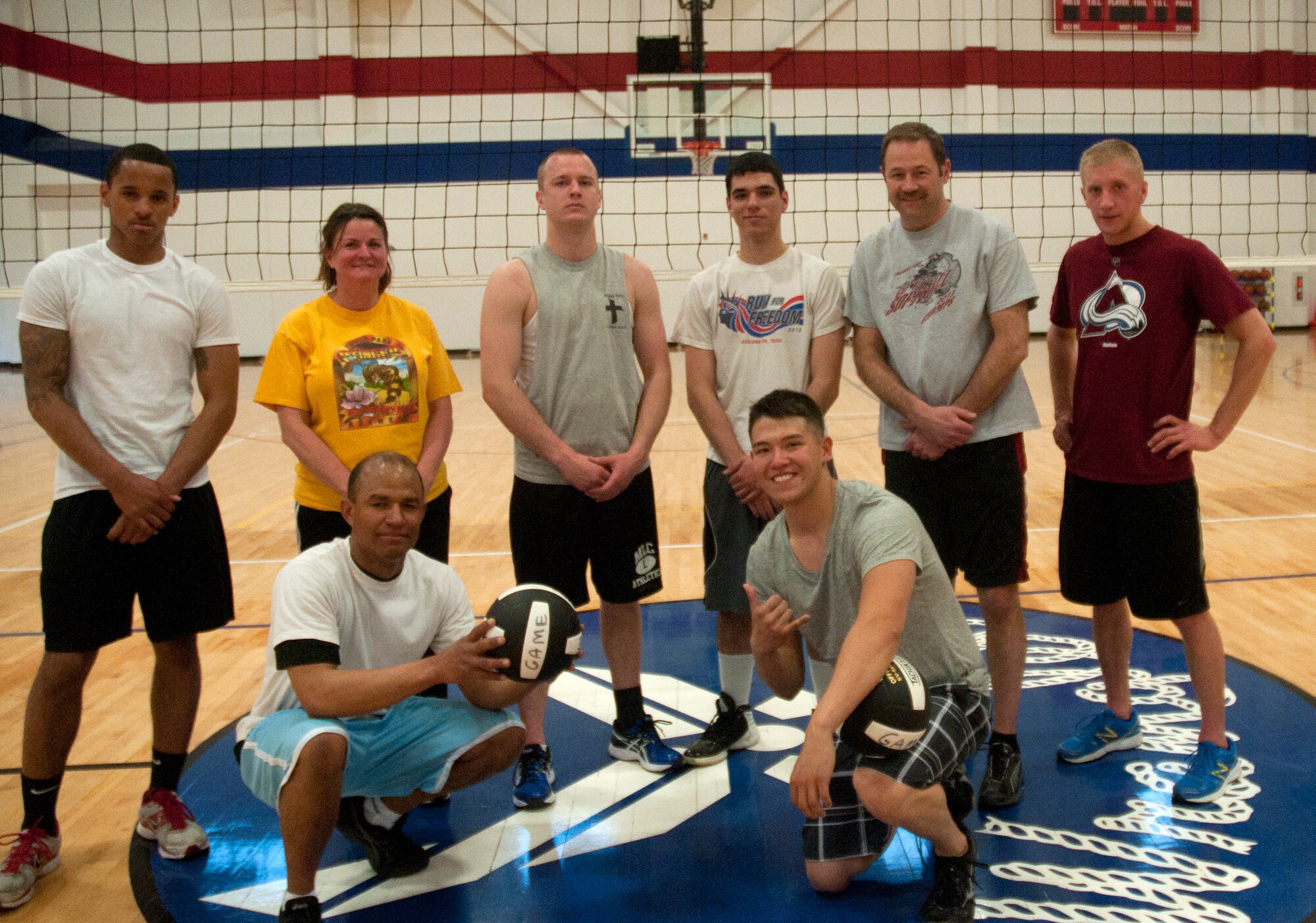 The 30th Airlift squadron poses after winning the 2014 Intramural Volleyball tournament April 21 in the Freedom Hall Fitness Center. (U.S. Air Force photo by Airman Malcolm Mayfield)