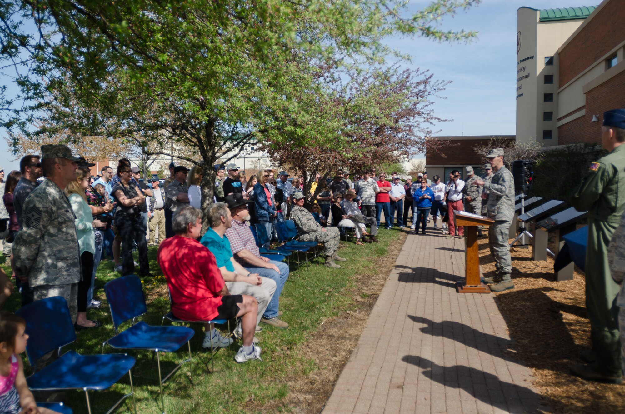 A ceremony held at the Kentucky Air National Guard Base in Louisville, Ky., April 12, 2014, honored more than 40 Kentucky Air National Guardsmen who retired from the unit in 2013. The retirees' names are inscribed on two marble tablets that were unveiled during the ceremony. (U.S. Air National Guard photo by Airman 1st Class Joshua Horton)