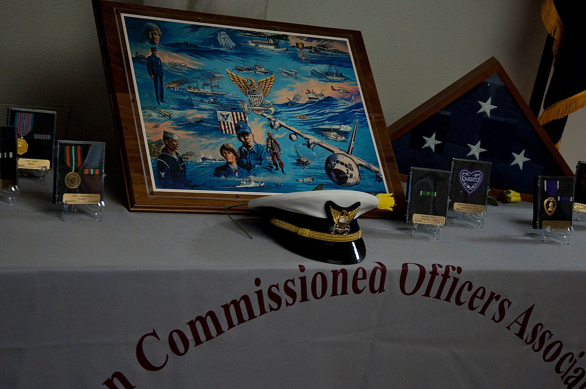 140419-F-GZ967-004 A display set up by 90th Medical Group personnel showcases “days gone by” during the Retiree Appreciation Day event in the 90th MDG Medical Treatment Facility April 19. Among the items on display were a Purple Heart and Medal of Honor medals and an American flag, folded and encased in a manner typical of those given at retirement ceremonies. (U.S Air Force photo by Airman 1st Class Brandon Valle))