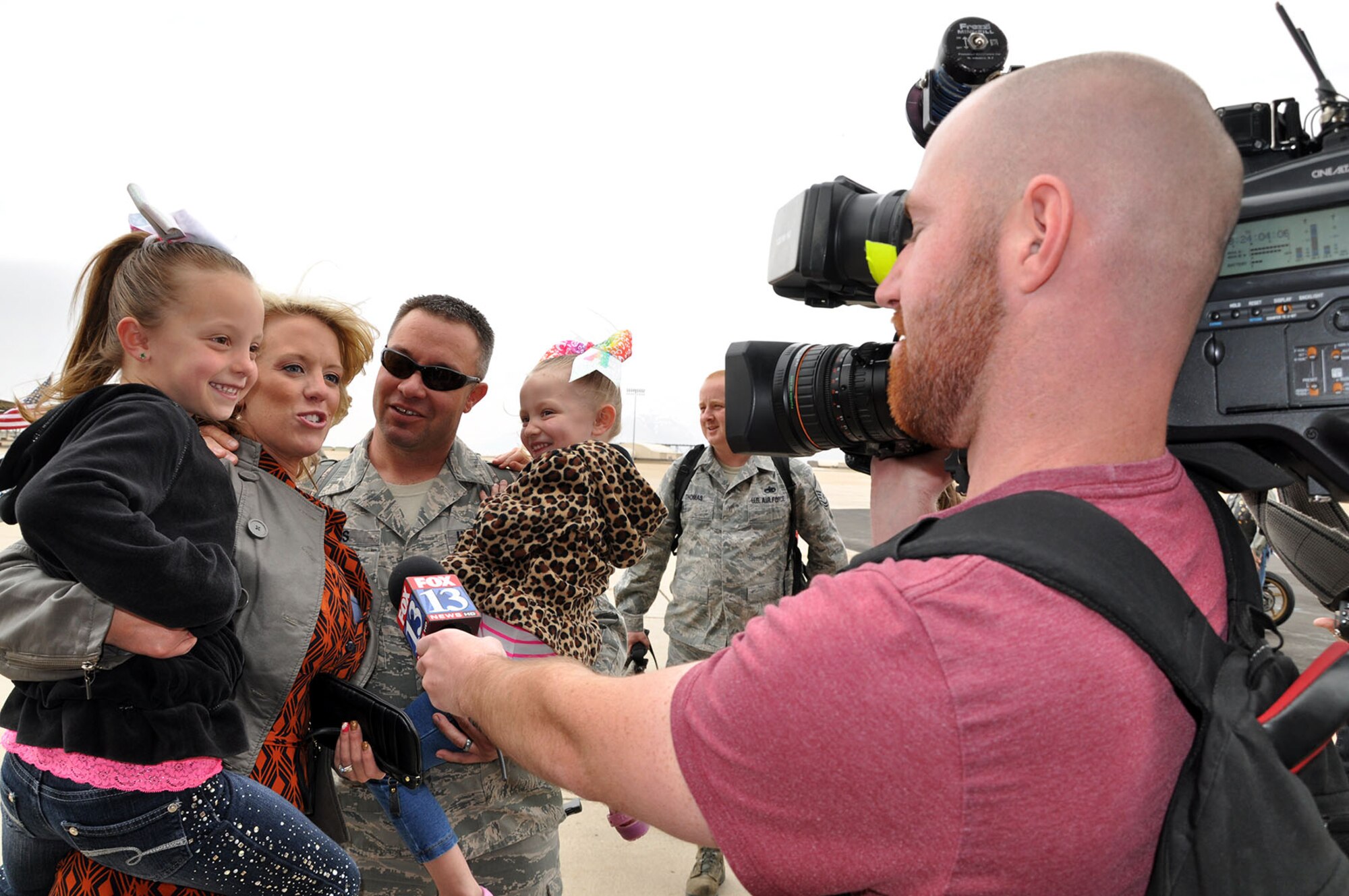 Local media interview Master Sgt. Jason Moss, 419th Aircraft Maintenance Squadron, and his family upon the Airman’s return home from a four-month deployment to the Republic of Korea. Moss and about 200 other Reserve and active-duty Airmen from the 419th and 388th Fighter Wings were in the region as part of a routine Theater Security Package rotation. (U.S. Air Force photo/Bryan Magaña)