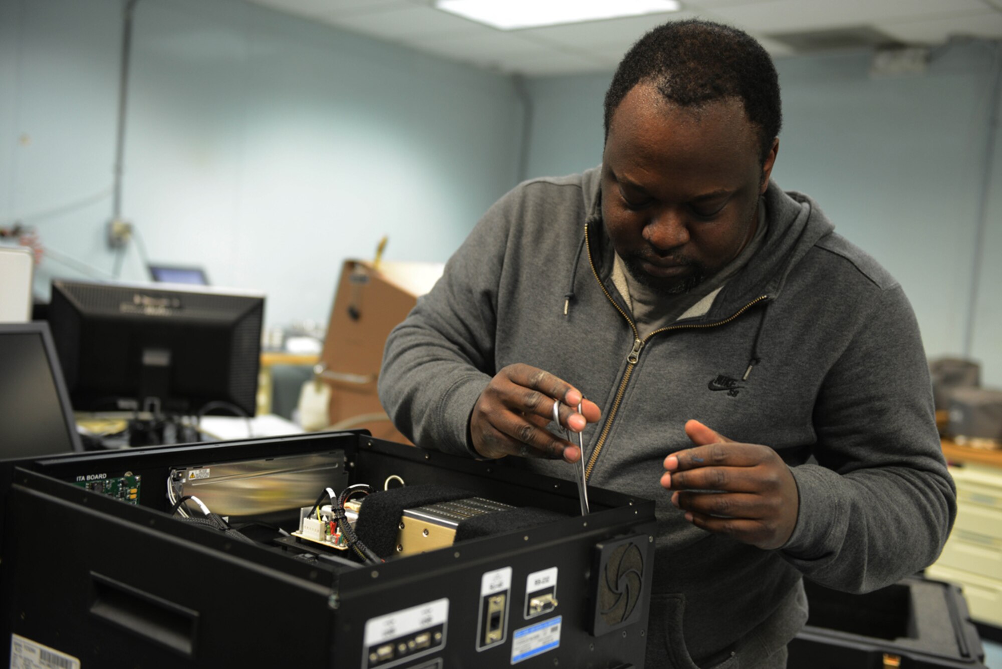JOINT BASE ELMENDORF-RICHARDSON-- Jerry Lawton, 3rd Maintenance Squadron Precision Maintenance Equipment Lab technician, performs maintenance on a Air Data Calibrator 2500 at the PMEL on Joint Base Elmendorf-Richardson, Alaska, April 16, 2014. The PMEL services an average of 190 customers, customers range from all branches of the Department of Defense and other federal agencies. (U.S. Air Force photo/Airman 1st Class Ty-Rico Lea)