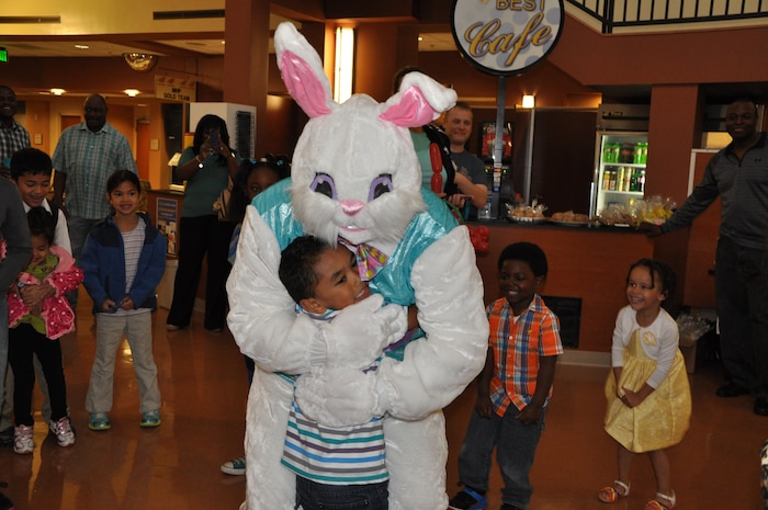 A very egg-stra special guest hugs 5-year old Preston Reid, son of Petty Officer 1st Class Scott Reid, Naval Health Clinic Charleston Dental leading petty officer during an Easter celebration April 19, 2014, at NHCC. (U.S. Navy photo/Petty Officer 3rd Class Caralyn Mulyk)