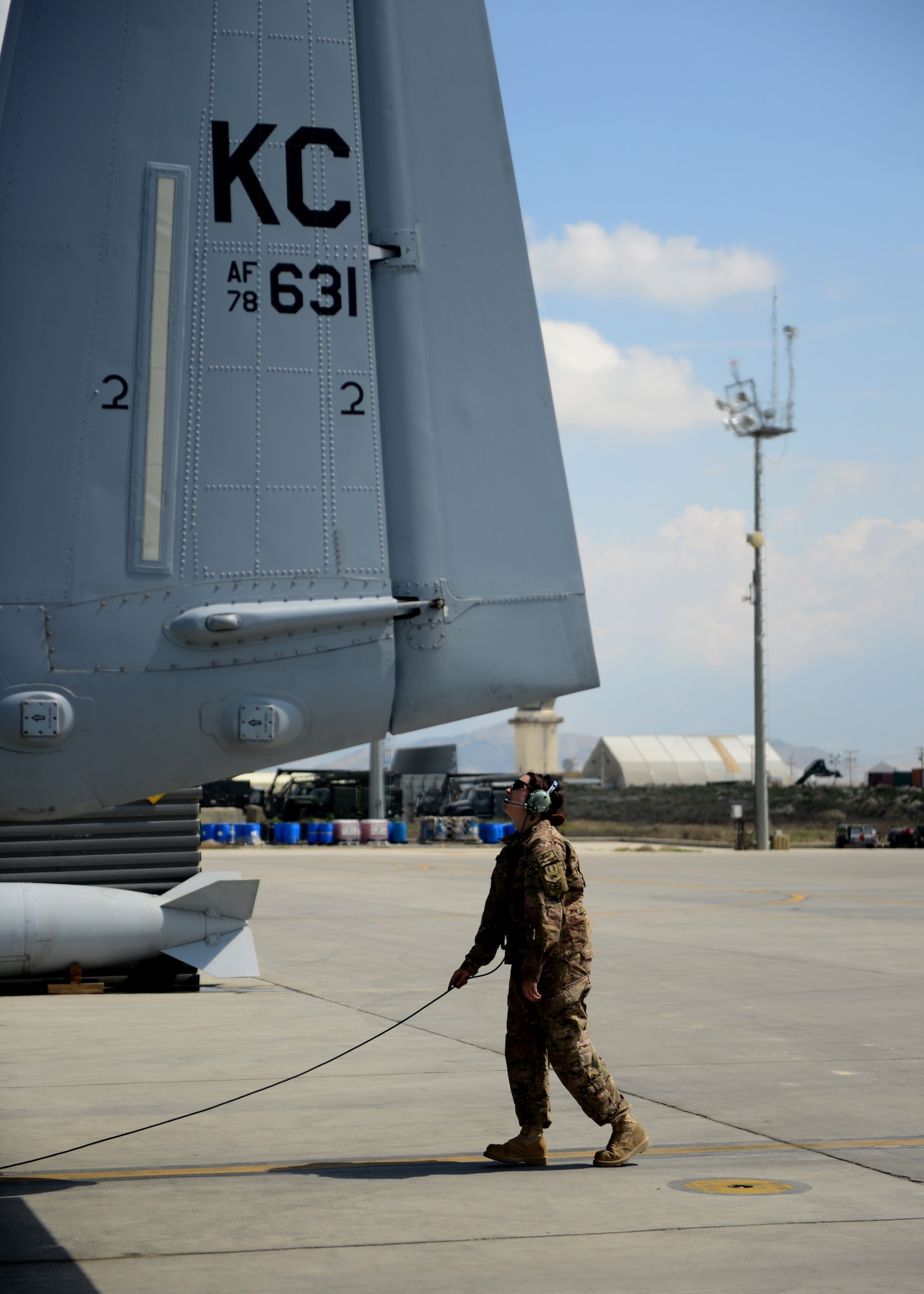U.S. Air Force Staff Sgt. Katherine Garneau, 455th Expeditionary Aircraft Maintenance Squadron crew chief, prepares an A-10 Thunderbolt II before a sortie April 20, 2014 at Bagram Air Base, Afghanistan. Garneau is  a native of Arivaca, Ariz. and is deployed from the 303rd Fighter Squadron at Whiteman Air Force Base.  The reserve unit recently replaced the 75th Fighter Squadron from Moody Air Force Base, Ga. for the latest deployment rotation.  (U.S. Air Force photo by Staff Sgt. Evelyn Chavez/Released)