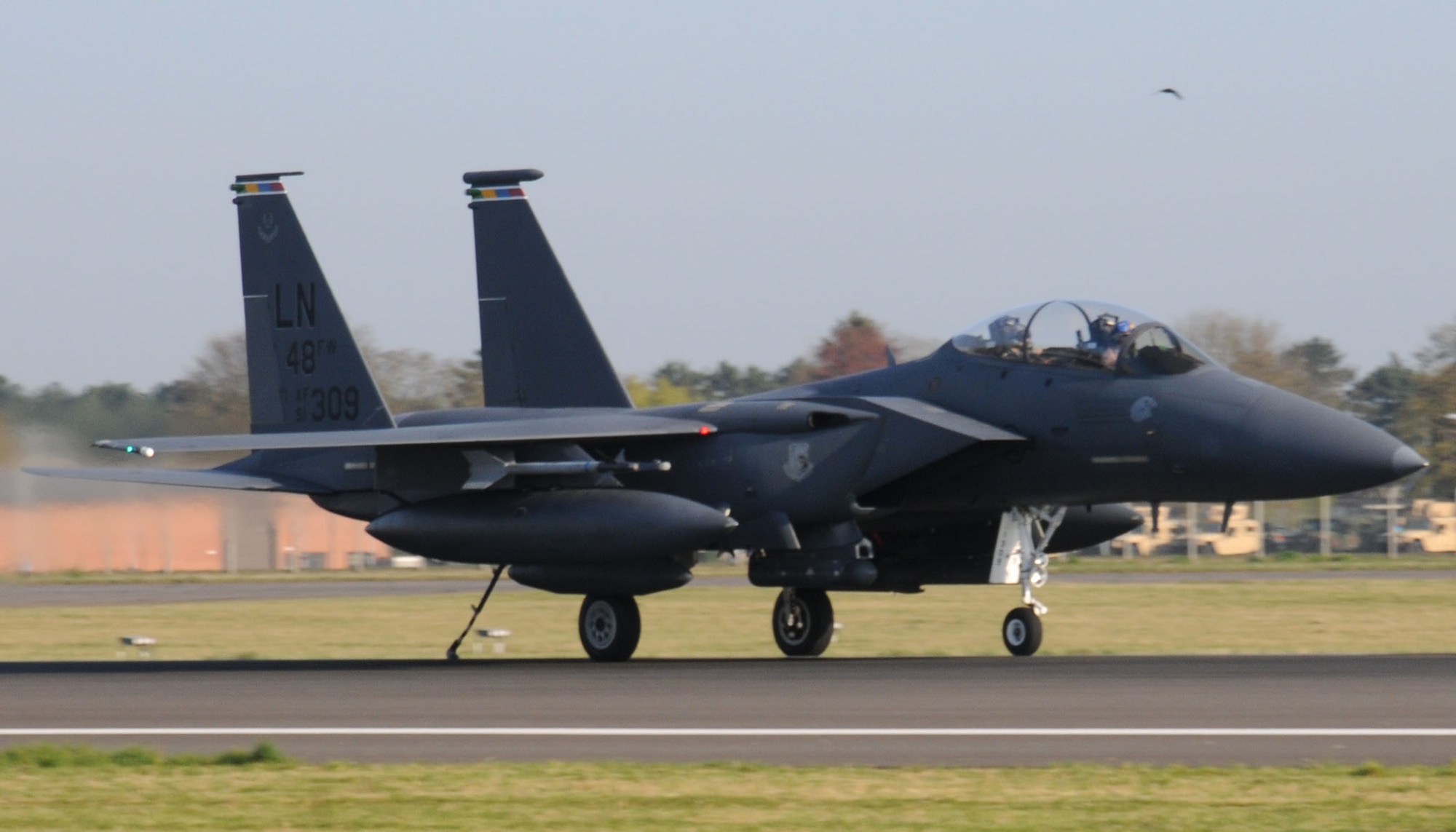 An F-15E Strike Eagle assigned to RAF Lakenheath, England, tests runway barriers April 17, 2014, on RAF Mildenhall, England. The 100th Civil Engineer Squadron certifies the barrier annually to test serviceability and operational ability. (U.S. Air Force photo by Gina Randall/Released)