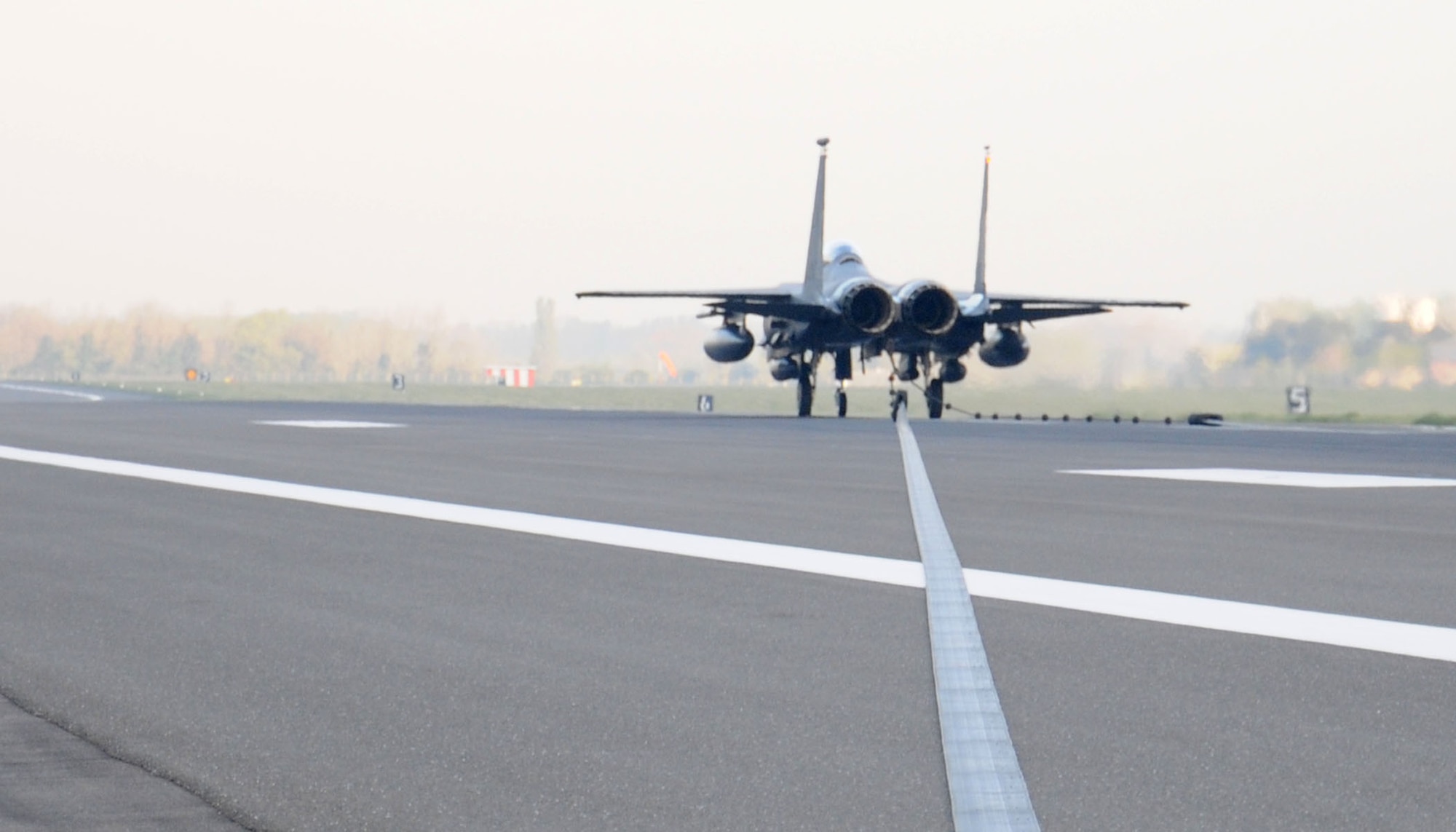 An F-15E Strike Eagle assigned to RAF Lakenheath, England, tests the runway barriers April 17, 2014, on RAF Mildenhall, England. The 100th Civil Engineer Squadron certifies the barrier annually to test serviceability and operational ability. (U.S. Air Force photo by Gina Randall/Released)