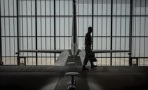 Senior Airman Steve Rogers, 86th Aircraft Maintenance Squadron crew chief, walks across the wings of a C-130J Super Hercules on Ramstein Air Base, Germany, April 21, 2014. Rogers, an Atlanta native, was preparing the wings for a safety inspection. (U.S. Air Force photo/Airman 1st Class Jordan Castelan)