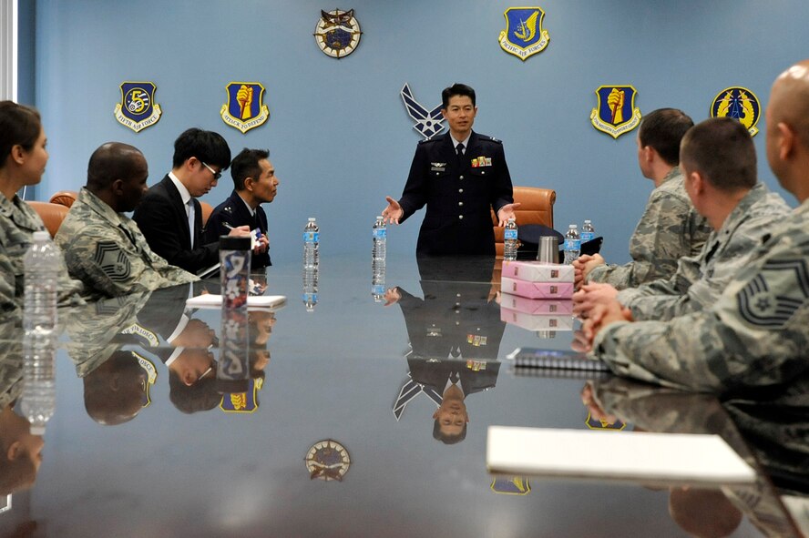 Japan Air Self-Defense Force Col. Kazuhiko Yoshimura, communications and computer security evaluation group commander, speaks to 35th Communication Squadron leadership, during a visit to Misawa Air Base, Japan, April 22, 2014. The tour allowed a free flow of information to help strengthen the defense of the Pacific, which is a responsibility shared by the U.S. and JASDF cyber warriors. (U.S. Air Force photo/Staff Sgt. Tong Duong)