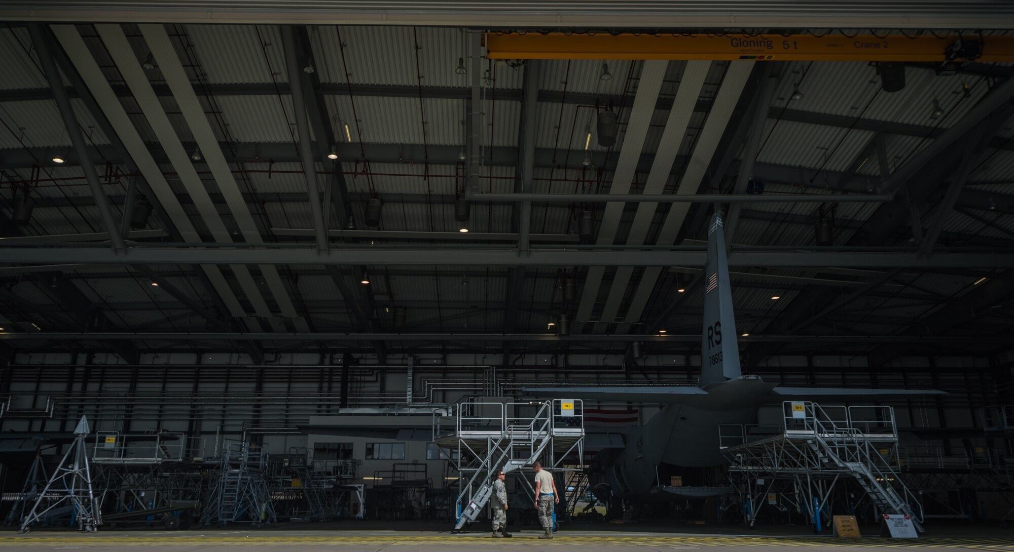 Senior Airman Steve Rogers, 86th Aircraft Maintenance Squadron crew chief, right, and Master Sgt. Shannon Hondo Smith, 86th AMXS aircraft generation section chief, left, inspect a C-130J Super Hercules on Ramstein Air Base, Germany, April 21, 2014. Rogers, an Atlanta native, and Smith, a San Antonio native, were preparing the aircraft for a safety inspection. (U.S. Air Force photo/Airman 1st Class Jordan Castelan)