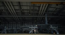Senior Airman Steve Rogers, 86th Aircraft Maintenance Squadron crew chief, right, and Master Sgt. Shannon Hondo Smith, 86th AMXS aircraft generation section chief, left, inspect a C-130J Super Hercules on Ramstein Air Base, Germany, April 21, 2014. Rogers, an Atlanta native, and Smith, a San Antonio native, were preparing the aircraft for a safety inspection. (U.S. Air Force photo/Airman 1st Class Jordan Castelan)