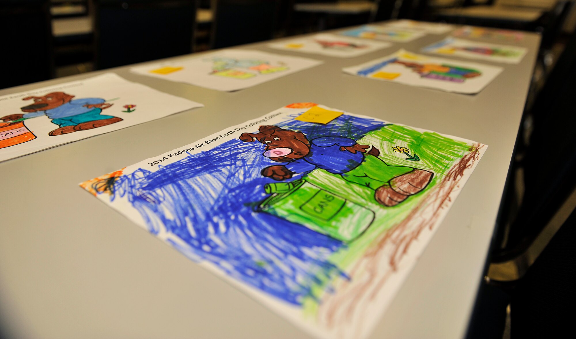 Art is arranged for voting during the Earth Day art contest at the Schilling Community Center on Kadena Air Base, Japan, April 21, 2014. Earth Day was first celebrated in 1970, and is now coordinated globally by the Earth Day Network, and celebrated in more than 192 countries each year. (U.S. Air Force photo by Naoto Anazawa)