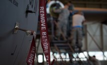 A group of 86th Aircraft Maintenance Squadron aerospace propulsion technicians, ready an engine for repair on Ramstein Air Base, Germany, April 21, 2014. The 86th AMXS team replaced a prop shaft adapter on a C-130J Super Hercules. (U.S. Air Force photo/Airman 1st Class Jordan Castelan)