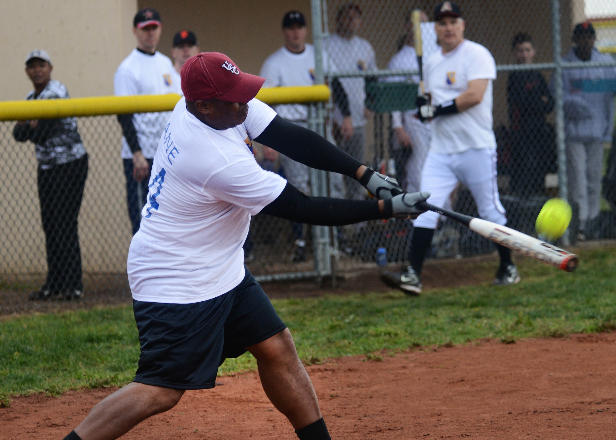 Col. Harry Lane, 31st Mission Support Group commander, hits a softball during the annual Chiefs and Eagles game at the “Baseball Blast-off” event. The annual baseball game was played during the Aviano Youth Program summer kick-off event to promote summer sports. The AYP is offering baseball, girls’ softball and flag football throughout the summer. (U.S. Air Force photo/Airman 1st Class Deana Heitzman)    