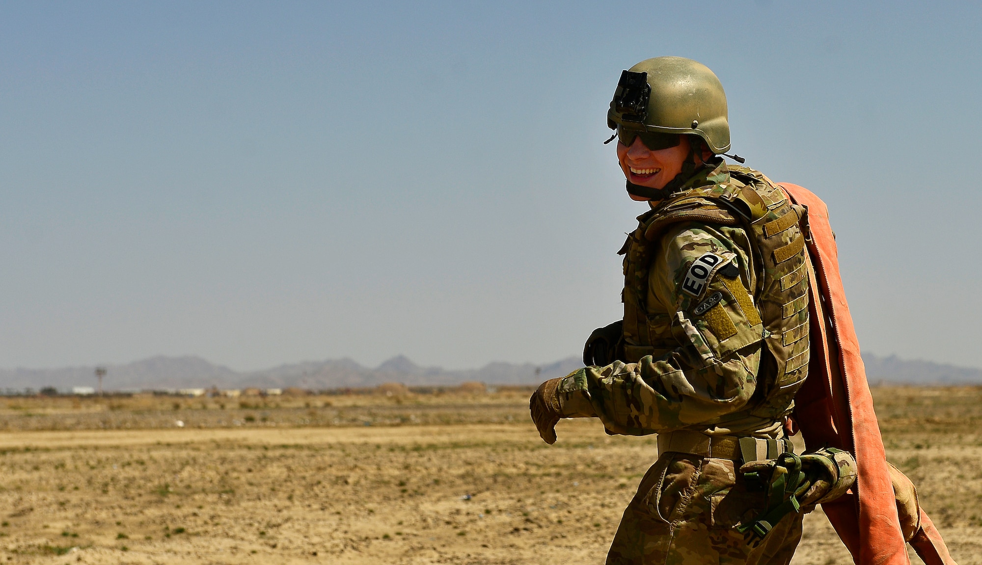 Staff Sgt. Kyle McGann enjoys removing a vehicle towing device March 16, 2014, during EOD demolition day at Kandahar Air Field, Afghanistan. McGann is a 466th Air Expeditionary Squadron, Explosive Ordnance Disposal technician and responsible for robot operation during EOD missions and ammunition accountability. The Molalla, Ore. native, is deployed from the 627th Civil Engineering Squadron, Patrick Air Force Base, Calif. More than 1,200 Operation Enduring Freedom Airmen are deployed in Joint Expeditionary Tasking and Individual Augmentee-status to conduct non-traditional Air Force missions with joint-service partners throughout Afghanistan. McGann and more than 350 other Airmen serve in JET/IA positions throughout Afghanistan's Regional Command South, Southwest and West attached to the U.S. Air Force 466th Air Expeditionary Squadron at Kandahar AF. (U.S. Air Force photo/Staff Sgt. Vernon Young Jr.) 

