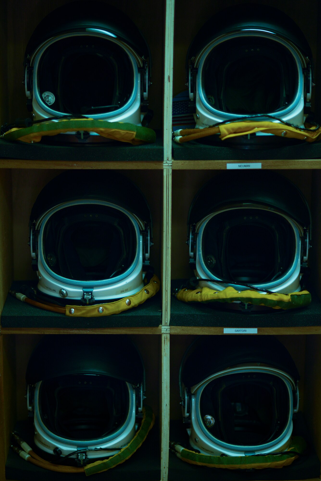Full pressure suit helmets sit in the aircrew locker room at the 99th Expeditionary Reconnaissance Squadron April 20, 2014, at a flightline in Southwest Asia. The helmets, unique to the U-2 Dragon Lady, are the only ones in the Air Force capable of sustaining pilots during high altitude flight. (U.S. Air Force photo/Tech. Sgt. Russ Scalf)