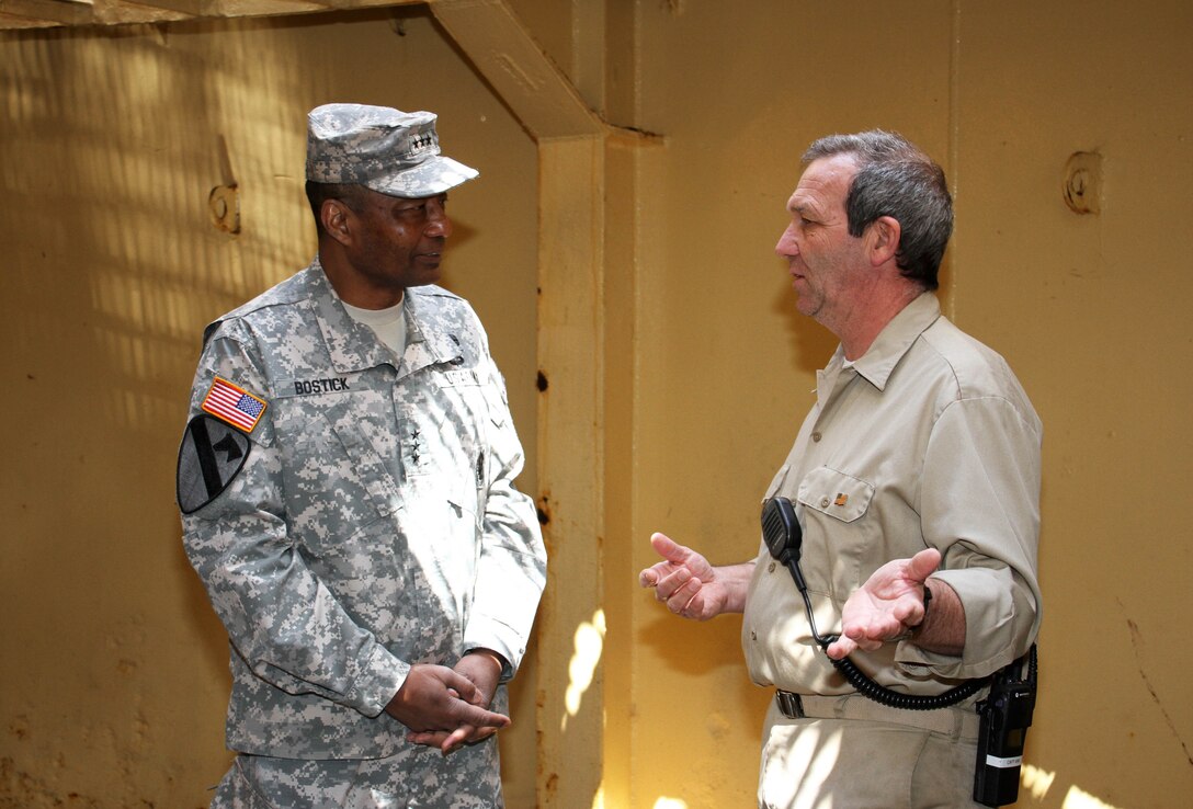 Dredge McFarland Capt. Karl Van Florcke and Lt. Gen. Thomas P. Bostick, U.S. Army Corps of Engineers Commanding General and the Chief of Engineers, discussed the Mac's dredging capabilities during an April 23 visit to the Philadelphia District.