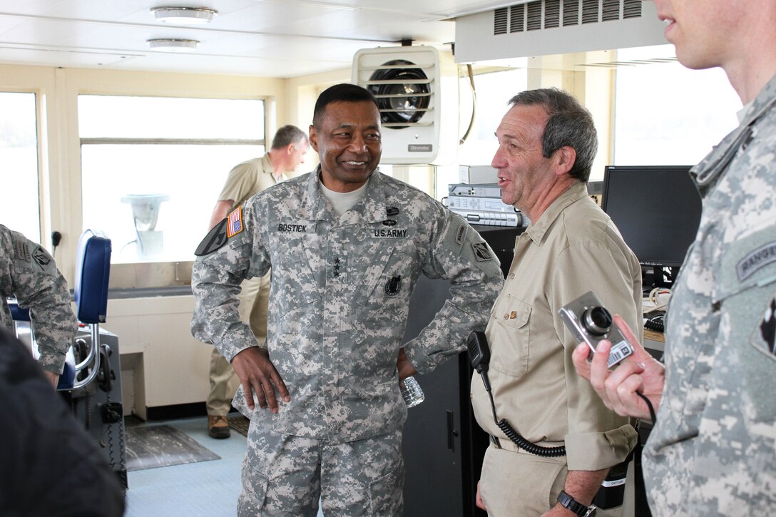 Dredge McFarland Capt. Karl Van Florcke and Lt. Gen. Thomas P. Bostick, U.S. Army Corps of Engineers Commanding General and the Chief of Engineers, discussed the Mac's dredging capabilities during an April 23 visit to the Philadelphia District. 