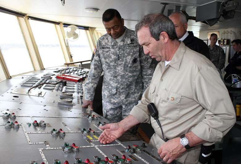 Dredge McFarland Capt. Karl Van Florcke demonstrates vessel controls to Lt. Gen. Thomas P. Bostick, U.S. Army Corps of Engineers Commanding General and the Chief of Engineers, during an April 23 visit to the Philadelphia District. 