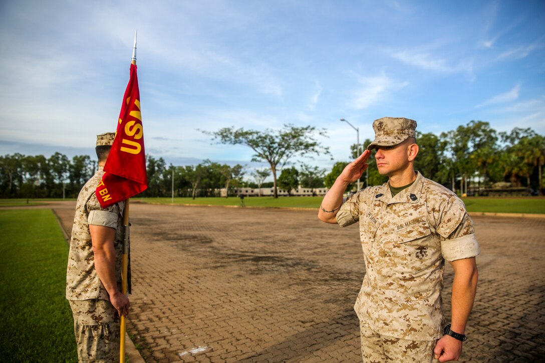 Sgt. Maj. Rogelio De Leon, sergeant major of Marine Rotational Force – Darwin, salutes company commanders, assuring full attendance in anticipation of a speech by Brig. Gen. John Frewen, 1st Brigade commanding general and senior Australian Defence Force officer for Robertson Barracks, about the six-month rotation, expectations and the significance of their presence, April 11. Frewen said the rotation is a tangible sign of the strength between Australia and the United States.