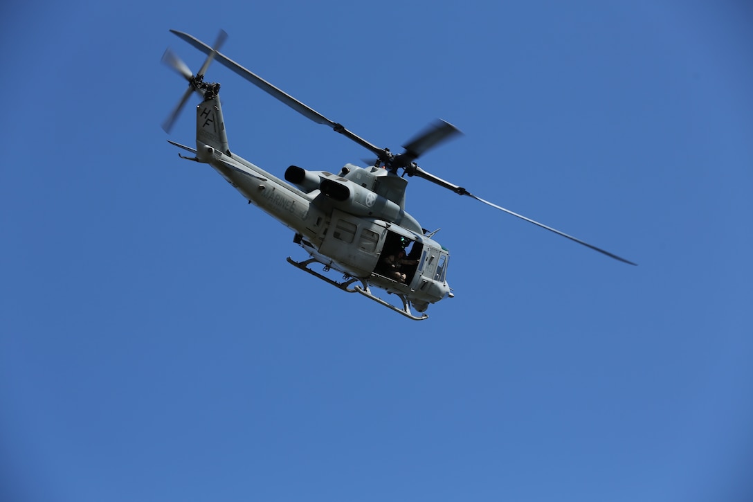 A UH-1Y Venom helicopter with Marine Light Attack Helicopter Squadron 269 provided support during a demonstration of Military Operations in Urban Terrain during World War II Day aboard Marine Corps Base Camp Lejeune, N.C., April 24, 2014. World War II Day allowed veterans and their families to interact with Marines and sailors from 2nd Marine Division as well as learn about the present day Marine Corps.   