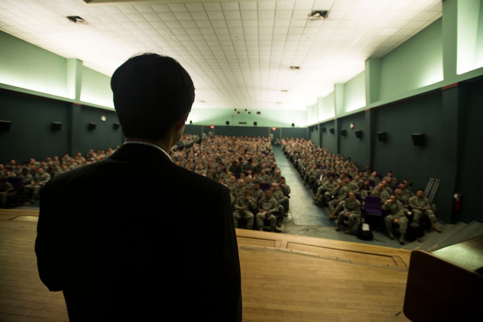 Shin Dong-hyuk, escapee of a North Korean interment camp, speaks to an audience about his life April 23, 2014, at Osan Air Base, Republic of Korea. Shin's story is featured in the movie Camp 14: Total Control Zone. (U.S. Air Force photo by Staff Sgt. Jake Barreiro)