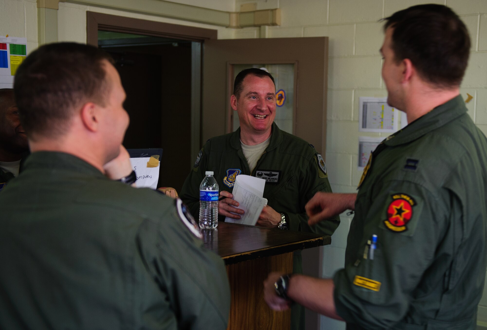 Col. Peter Bilodeau, 8th Operations Group commander, discusses flight plans prior to suiting up at Gwangju Air Base, Republic of Korea, April 22, 2014. More than 600 Department of Defense personnel participated in the 12th Max Thunder to develop and ensure bilateral aerial training for Airmen from the ROK and various U.S. branches. (U.S. Air Force photo by Senior Airman Armando A. Schwier-Morales/Released)