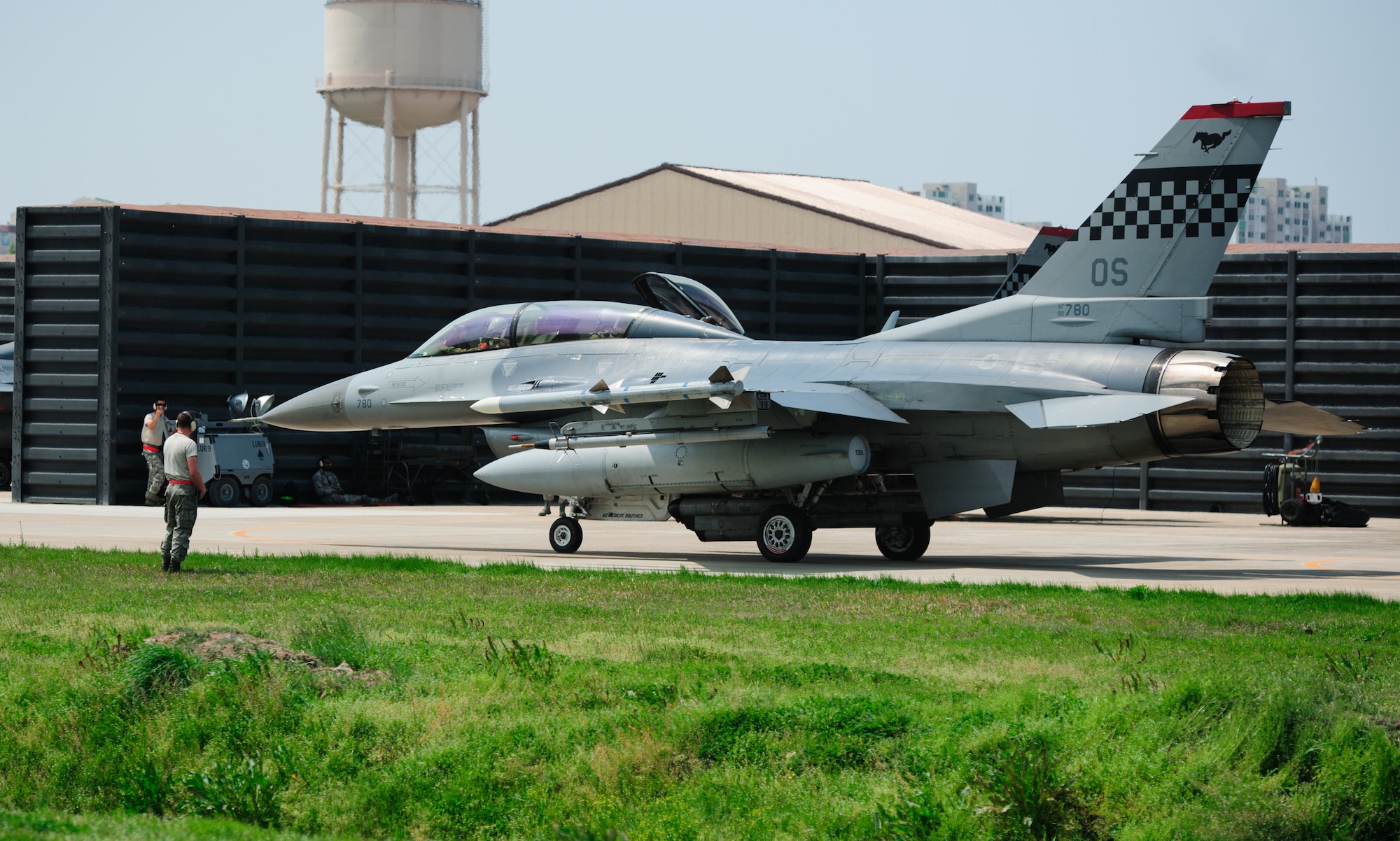 An Osan Air Base, Republic of Korea,  F-16 Fighting Falcon taxis to a sortie during Max Thunder at Gwangju Air Base, ROK, April 22, 2014. The two-week exercise is the air component-led portion of Exercise Foal Eagle and trains both ROK and U.S. Airmen on aerial training. (U.S. Air Force photo by Senior Airman Armando A. Schwier-Morales/Released)