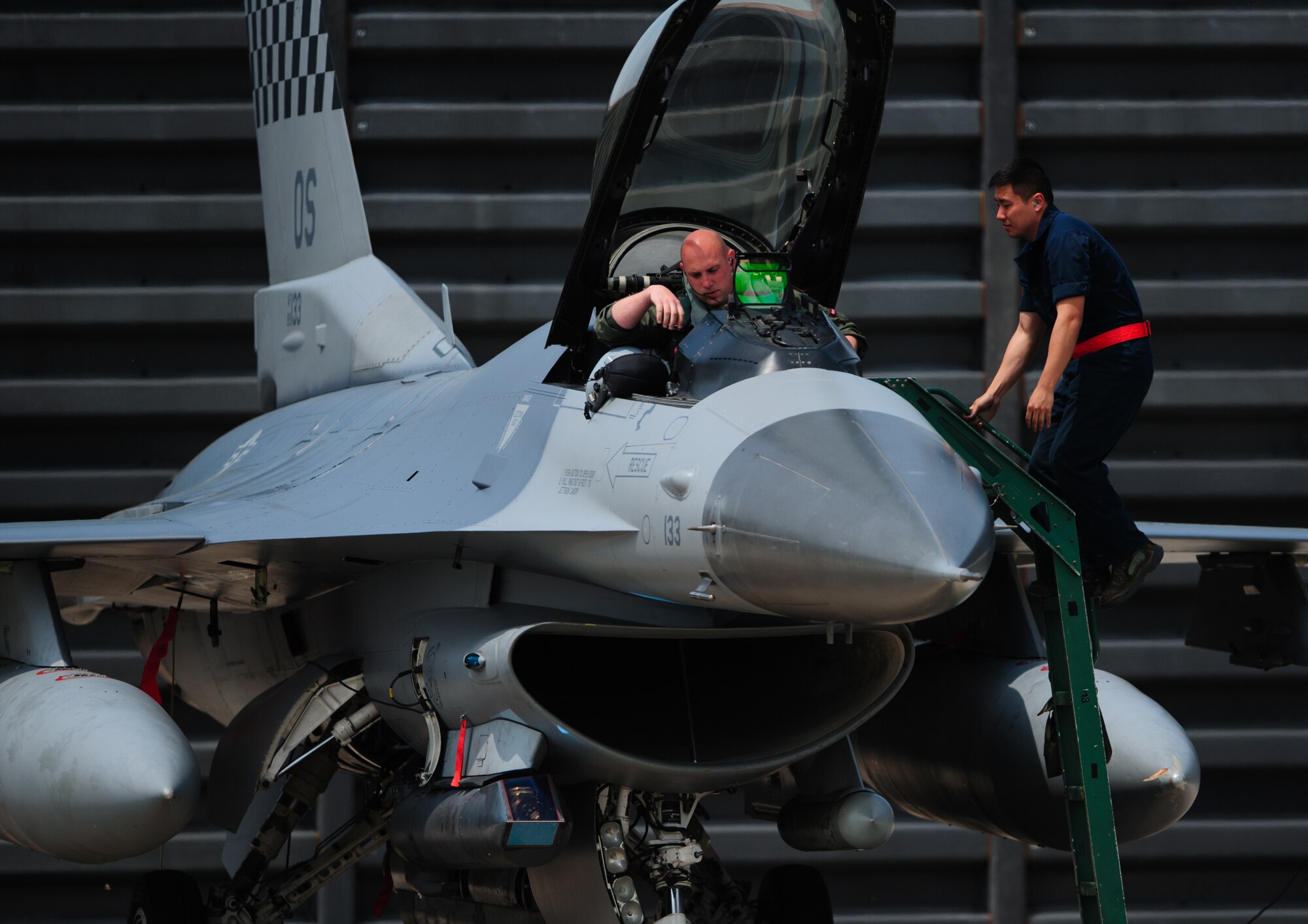 Airmen ready an Osan Air Base, Republic of Korea, F-16 Fighting Falcon for a sortie during Max Thunder at Gwangju Air Base, ROK, April 22, 2014. The two-week exercise is the air component-led portion of Exercise Foal Eagle and trains both ROK and U.S. Airmen on aerial training. (U.S. Air Force photo by Senior Airman Armando A. Schwier-Morales/Released)