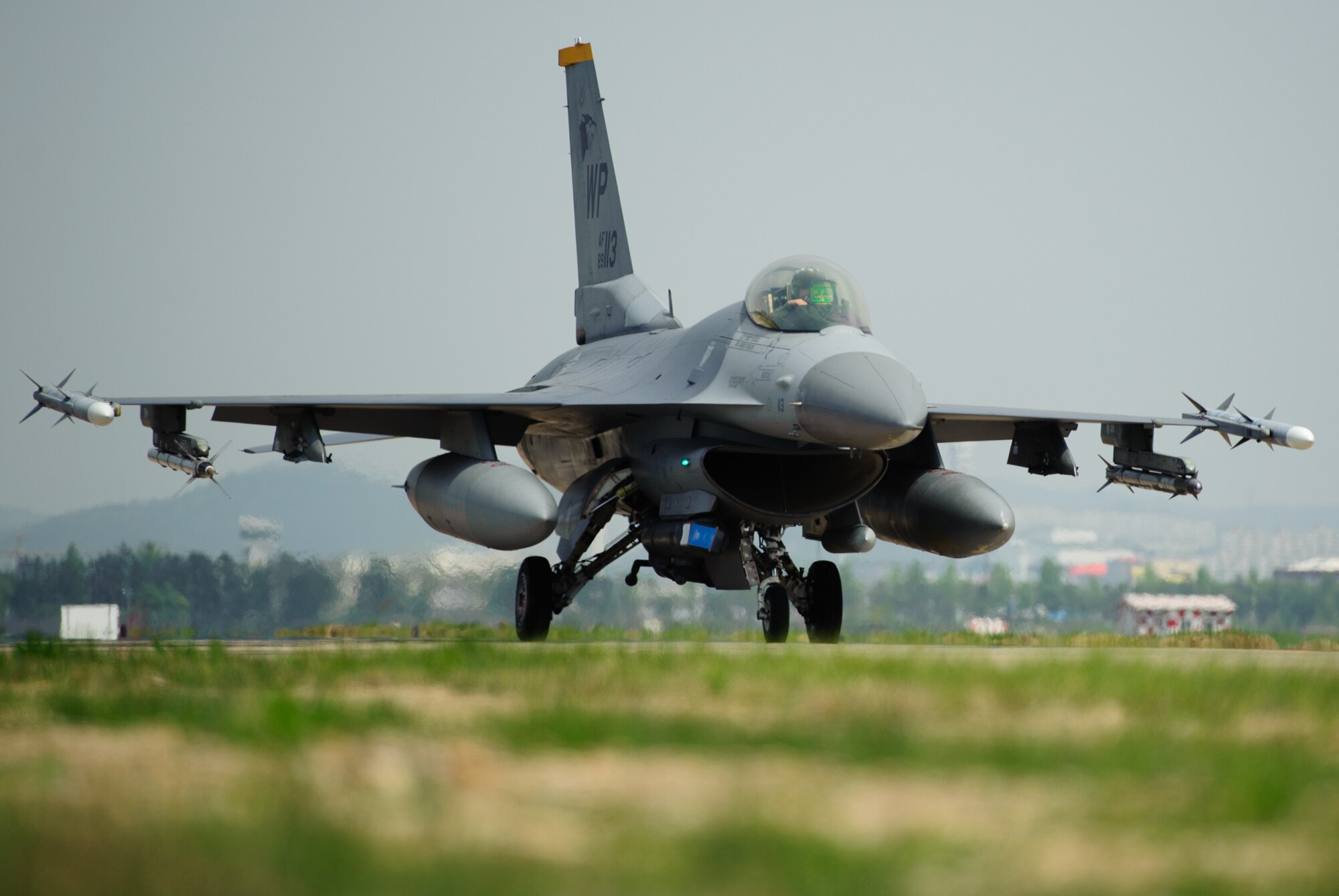 An 80th Fighter Squadron F-16 Fighting Falcon taxis to a sortie during Max Thunder at Gwangju Air Base, Republic of Korea, April 22, 2014. The two-week exercise is the air component-led portion of Exercise Foal Eagle and trains both ROK and U.S. Airmen on aerial training. (U.S. Air Force photo by Senior Airman Armando A. Schwier-Morales/Released)