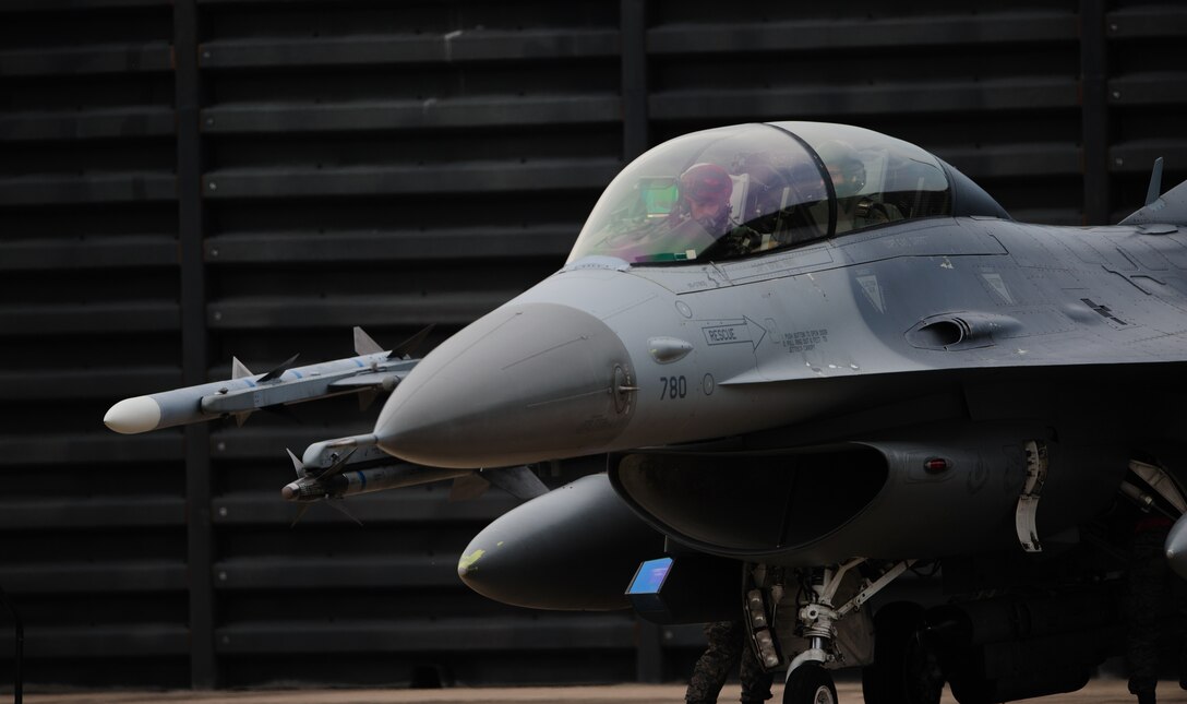 An Osan Air Base, Republic of Korea, F-16 Fighting Falcon readies to taxi to the runway to perform in a training scenario during the 12th Max Thunder at Gwangju Air Base, Republic of Korea, April 22, 2014.  The two-week exercise is the air component-led portion of Exercise Foal Eagle and trains both ROK and U.S. Airmen on aerial training. (U.S. Air Force photo by Senior Airman Armando A. Schwier-Morales/Released)
