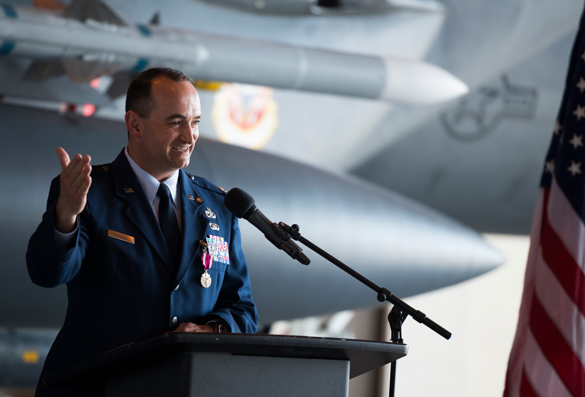 Retired Maj. Edward Schlegel, 366th Aircraft Maintenance Squadron, addresses the audience during his retirement ceremony April 18, 2014, at Mountain Home Air Force Base. He reflected on his numerous experiences during his career, quoting the movie "Forrest Gump" that life really was like a box of chocolates. However, he added that "they were all caramels," because he was surrounded by people who lifted him up. (U.S. Air Force photo by Tech. Sgt. Samuel Morse/RELEASED)
