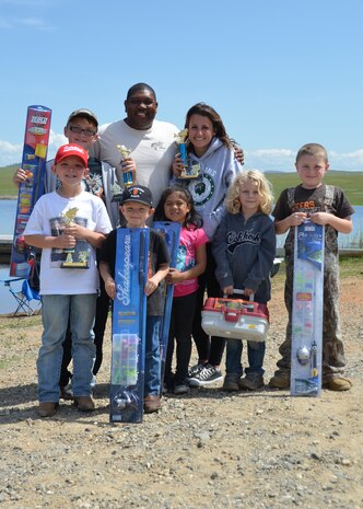 Winners of Beale’s 5th Annual Youth Fishing Derby pose for a picture at Upper Blackwelder Lake, on Beale Air Force Base, Calif., April 18, 2014. The Derby was sponsored by a local Prince Hall Masons chapter and the Beale Youth Center to give some of Beale’s youth the opportunity to catch their first fish. (Courtesy photo)
