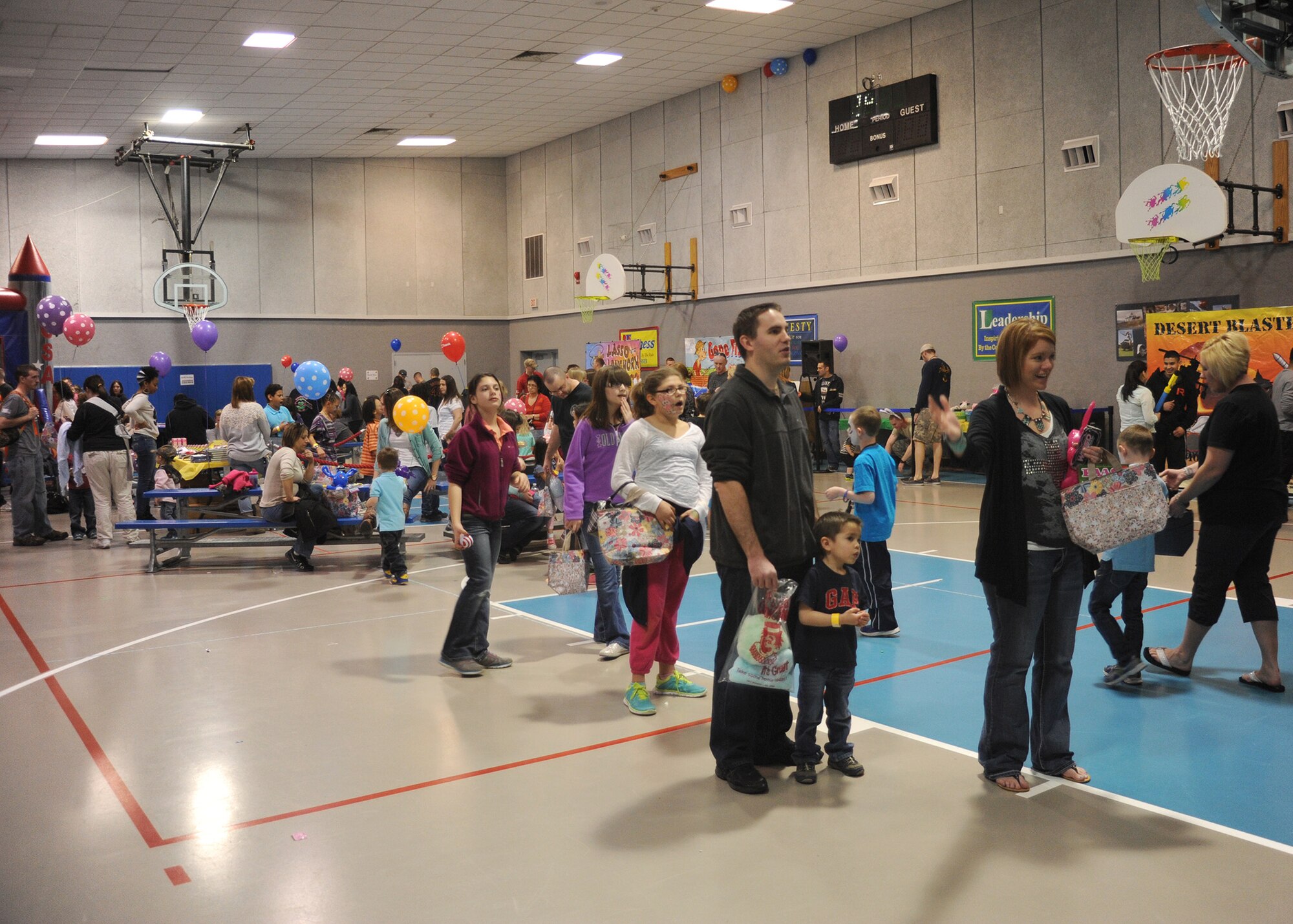 Parents and children of all ages participate in the annual Spring Carnival at the Youth Programs Center on April 19. The carnival had various games for children to play, music, food and also included a visit from the Easter Bunny. (U.S. Air Force photo/Senior Airman Cortney Paxton)