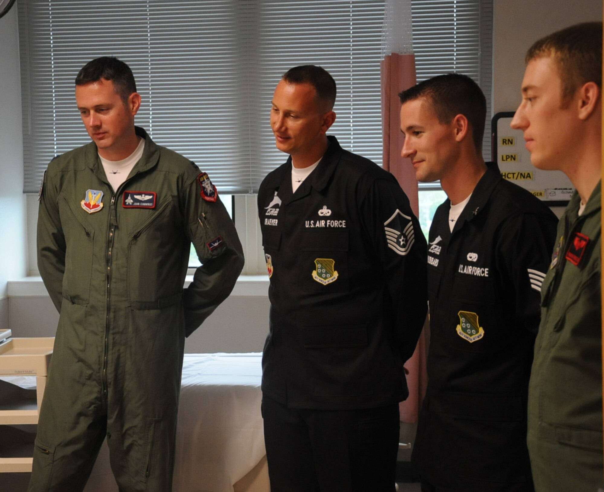 Members from the F-22 Raptor Demonstration Team and B-52H Stratofortress visit the Overton Brooks VA Medical Center, April 24, 2014. The Medical Center serves a population of more than 131,000 veterans residing within its primary service area, which encompasses 15 northeast Texas counties, five southwestern Arkansas counties and 12 northwest Louisiana parishes. The teams will be participating in the 2014 Defenders of Liberty Air Show on Barksdale Air Force Base, La., April 25-26, 2014. (U.S. Air Force photo/Staff Sgt. Sean Martin)
