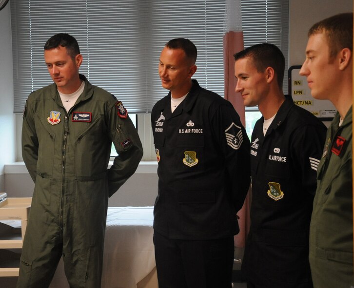 Members from the F-22 Raptor Demonstration Team and B-52H Stratofortress visit the Overton Brooks VA Medical Center, April 24, 2014. The Medical Center serves a population of more than 131,000 veterans residing within its primary service area, which encompasses 15 northeast Texas counties, five southwestern Arkansas counties and 12 northwest Louisiana parishes. The teams will be participating in the 2014 Defenders of Liberty Air Show on Barksdale Air Force Base, La., April 25-26, 2014. (U.S. Air Force photo/Staff Sgt. Sean Martin)
