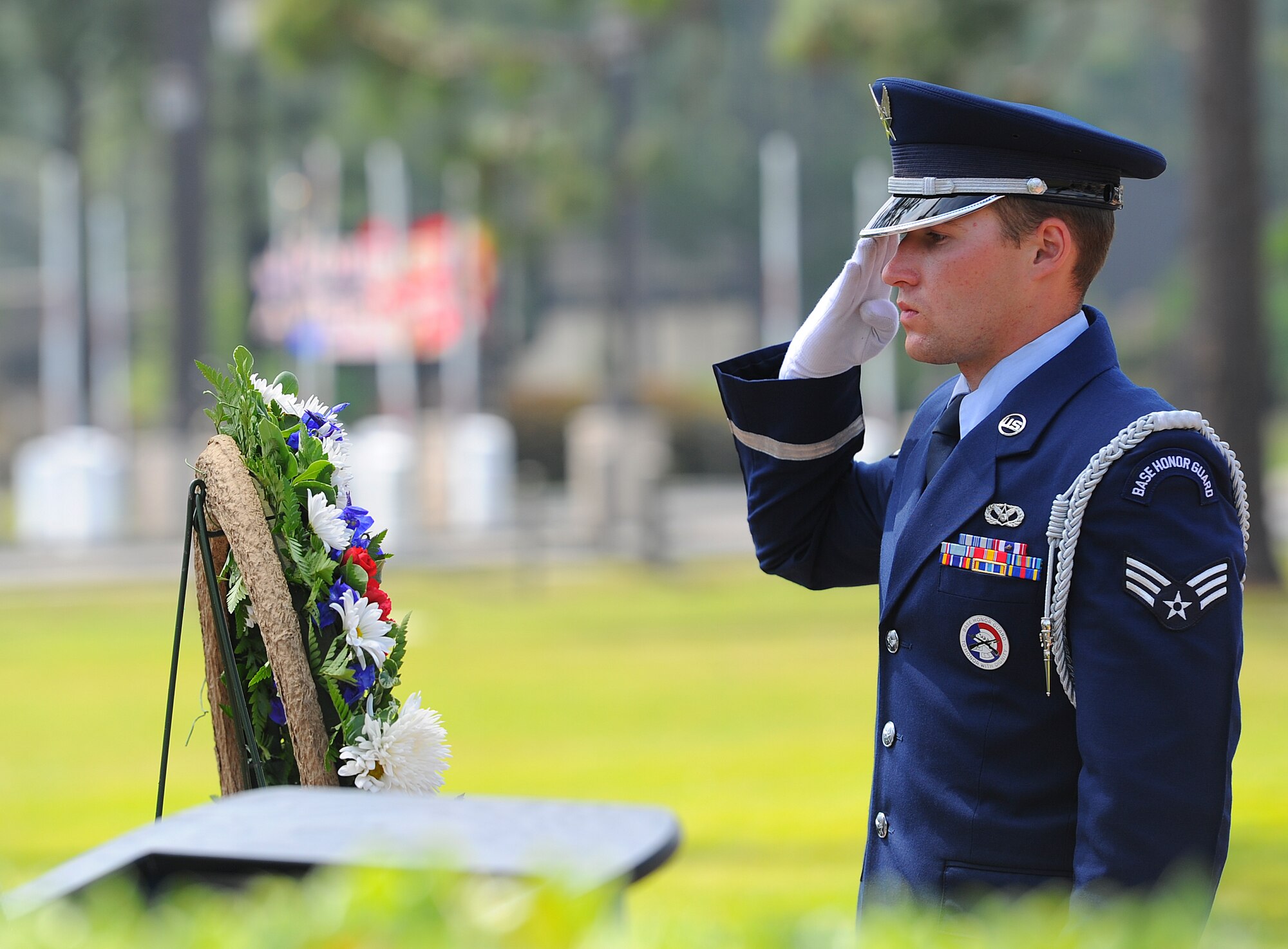 Senior Airman Joseph Royal, Hurlburt Field honor guardsman, salutes the Operation Eagle Claw memorial wreath at the air park on Hurlburt Field, Fla., April 24, 2014. Operation Eagle Claw encountered many obstacles and was eventually aborted.  (U.S. Air Force photo/Airman 1st Class Jeff Parkinson)

