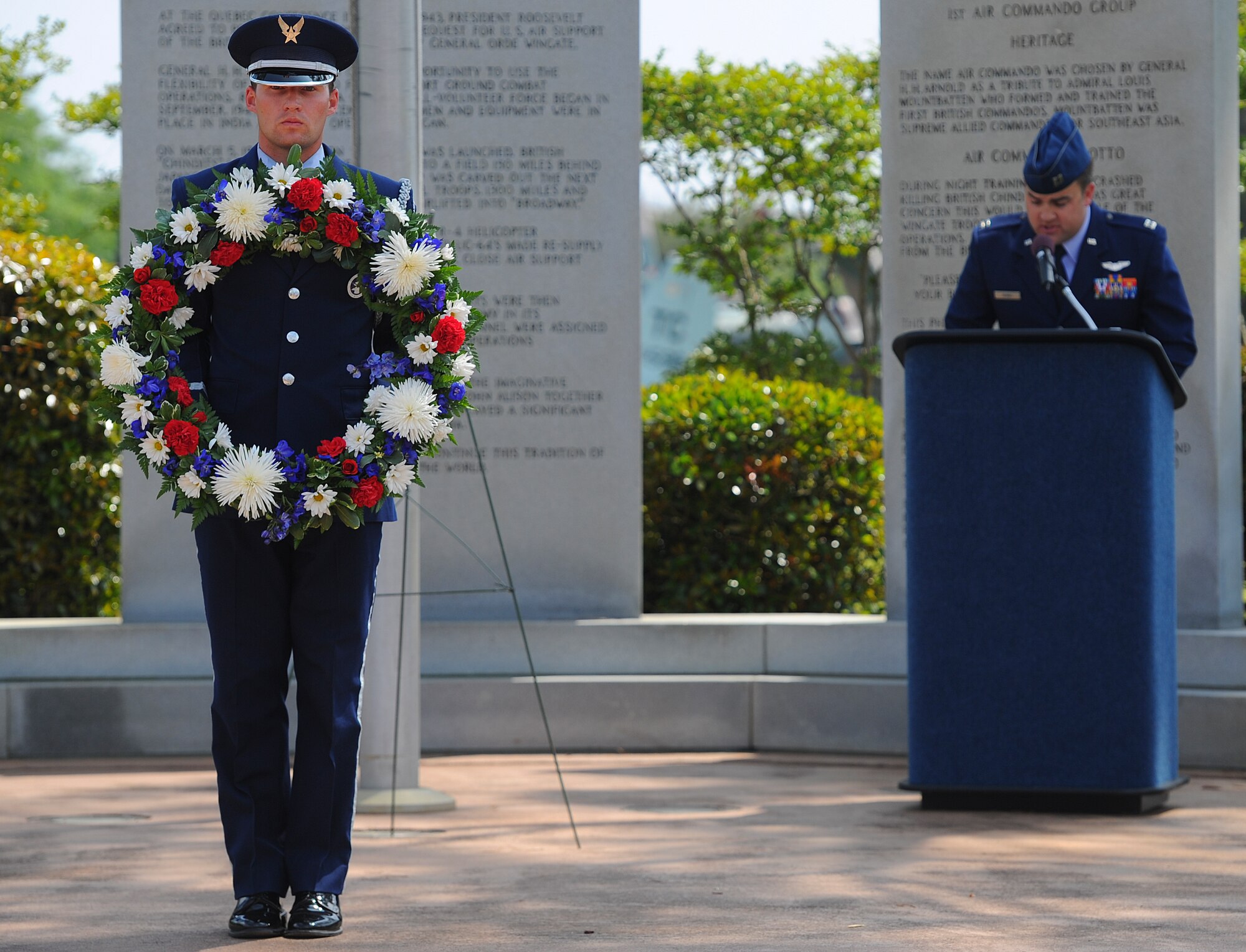 Senior Airman Joseph Royal, Hurlburt Field honor guardsman, presents the Operation Eagle Claw memorial wreath at the air park on Hurlburt Field, Fla., April 24, 2014. Operation Eagle Claw attempted to rescue 52 diplomats held captive at the embassy of the U.S., Tehran on April 24, 1980. (U.S. Air Force photo/Airman 1st Class Jeff Parkinson)